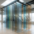 Translucent colored glass panels with downward trending export and volume reduction graphs